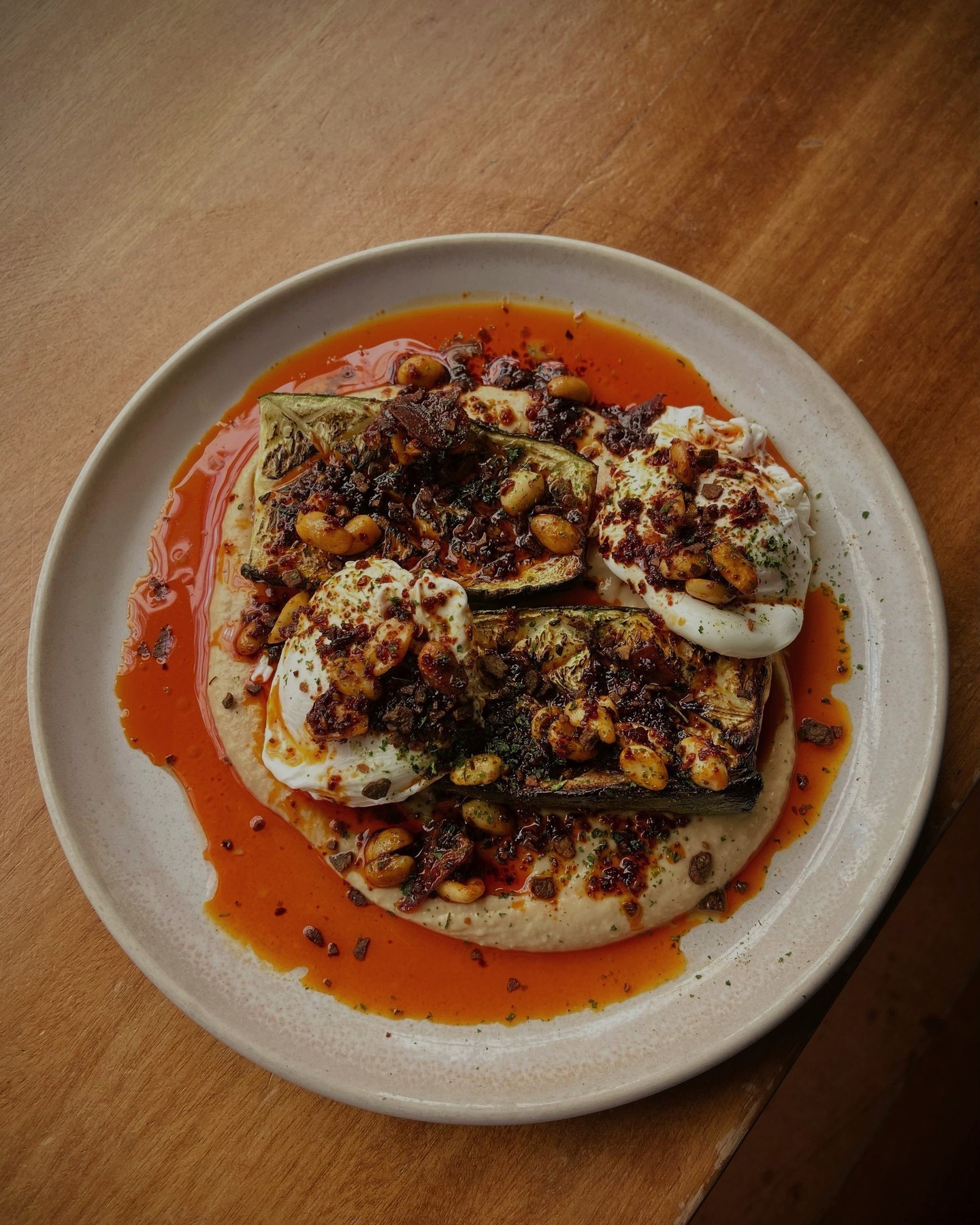 Zucchini and poached eggs with chilli